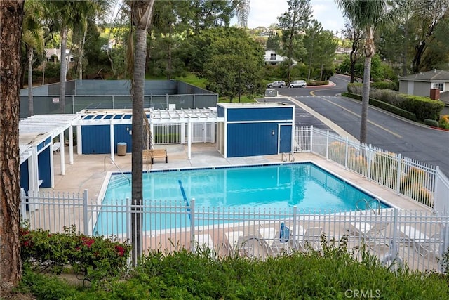 pool featuring fence