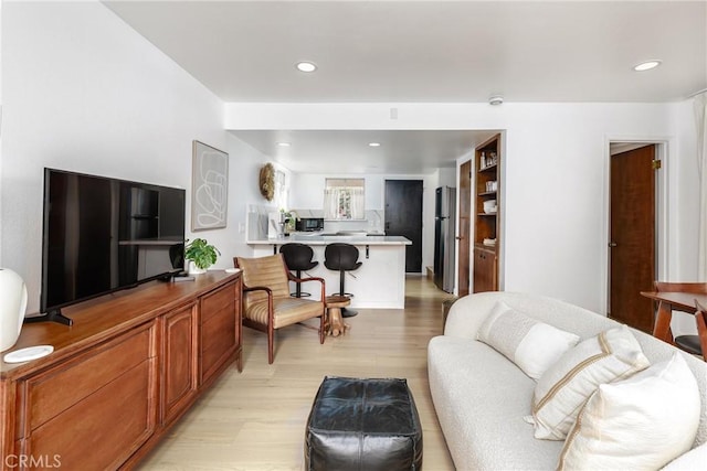 2650 Main St Unit 3, Cambria, CA 93428 - living room featuring light wood-style flooring and recessed lighting