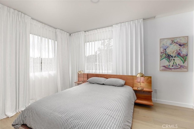2650 Main St Unit 3, Cambria, CA 93428 - bedroom with wood finished floors