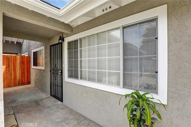 402 E Glendale Dr, Orange, CA 92865 - doorway to property with stucco siding and fence
