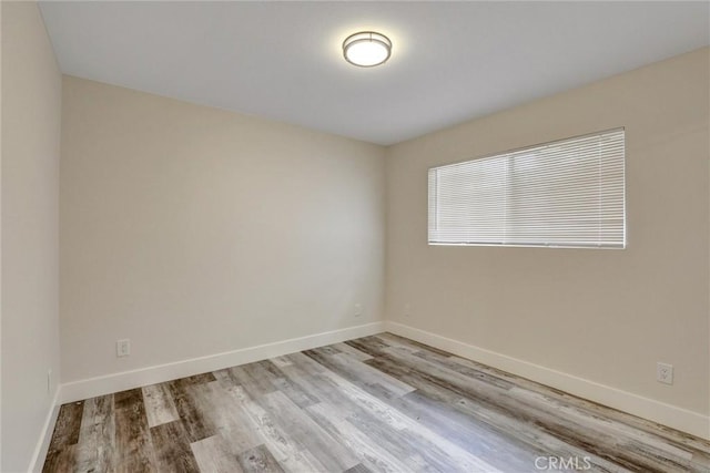 402 E Glendale Dr, Orange, CA 92865 - spare room featuring light wood-style floors and baseboards