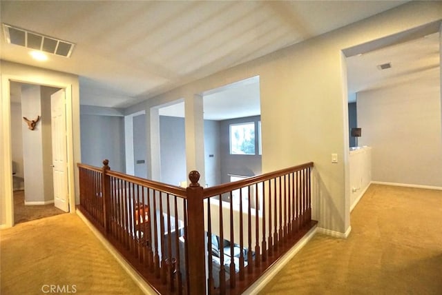 23801 Hollingsworth Dr, Murrieta, CA 92562 - hallway with carpet floors, baseboards, an upstairs landing, and visible vents