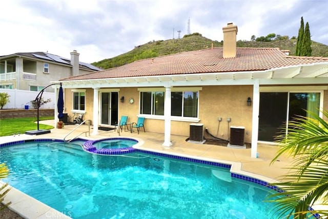 23801 Hollingsworth Dr, Murrieta, CA 92562 - rear view of house featuring a patio, cooling unit, a tile roof, and stucco siding