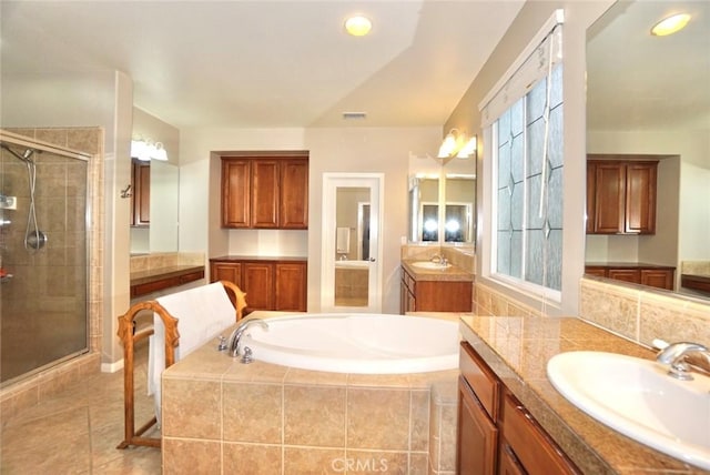 23801 Hollingsworth Dr, Murrieta, CA 92562 - bathroom featuring a garden tub, a sink, two vanities, and a shower stall