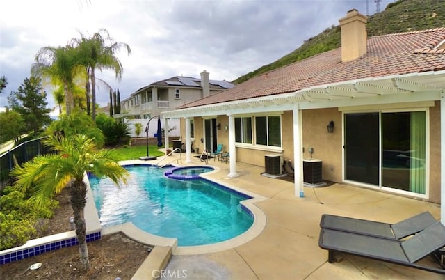 23801 Hollingsworth Dr, Murrieta, CA 92562 - view of swimming pool featuring a fenced in pool, a patio, an in ground hot tub, and central AC