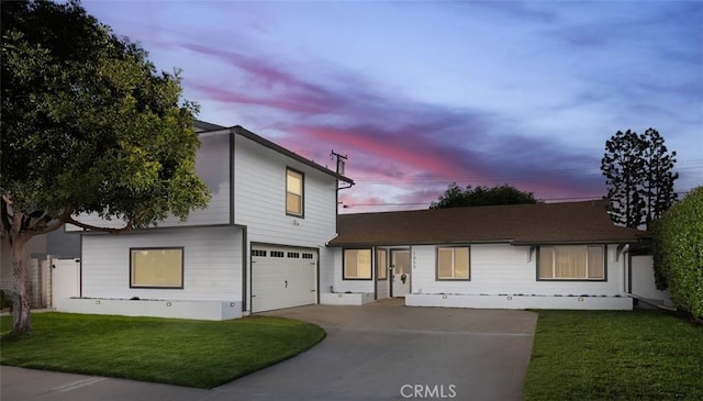 1055 N Mallard St, Orange, CA 92867 - view of front of house with a garage, driveway, and a front lawn