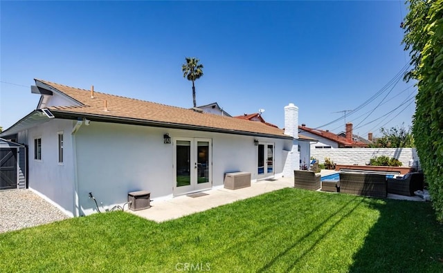 1055 N Mallard St, Orange, CA 92867 - back of house with french doors, stucco siding, an outdoor hangout area, and a patio