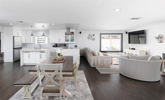 1055 N Mallard St, Orange, CA 92867 - dining space with dark wood finished floors and recessed lighting