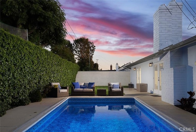 1055 N Mallard St, Orange, CA 92867 - view of pool with french doors, an outdoor hangout area, a patio area, and fence