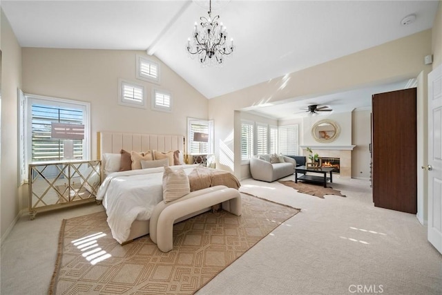 15 Pebble Bch, Coto De Caza, CA 92679 - bedroom featuring carpet, multiple windows, high vaulted ceiling, a glass covered fireplace, and a chandelier