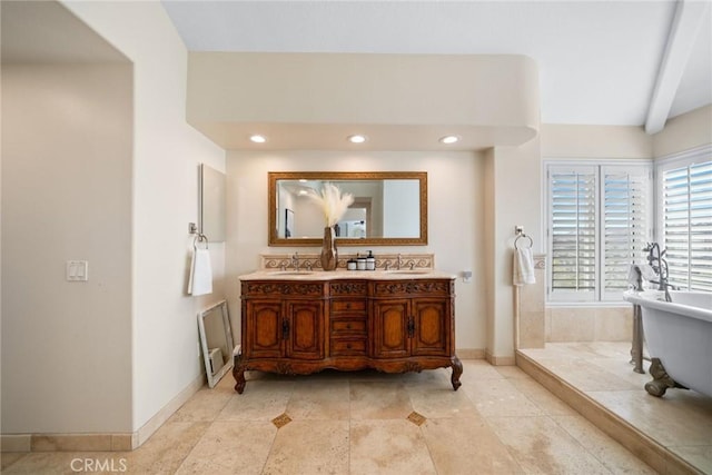 15 Pebble Bch, Coto De Caza, CA 92679 - bathroom featuring baseboards, a soaking tub, double vanity, and recessed lighting