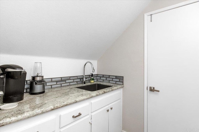 962 Chardonney Way, Escondido, CA 92029 - kitchen with decorative backsplash, a sink, lofted ceiling, and white cabinets