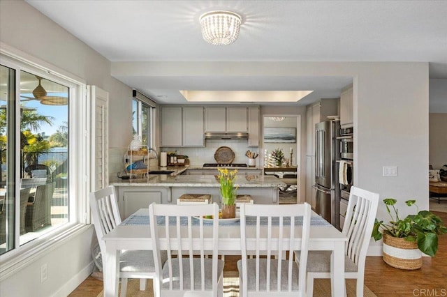 962 Chardonney Way, Escondido, CA 92029 - dining room with wood finished floors, a chandelier, and baseboards