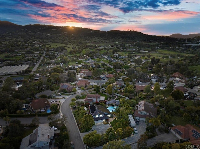 962 Chardonney Way, Escondido, CA 92029 - aerial view of property and surrounding area featuring a mountain backdrop and nearby suburban area