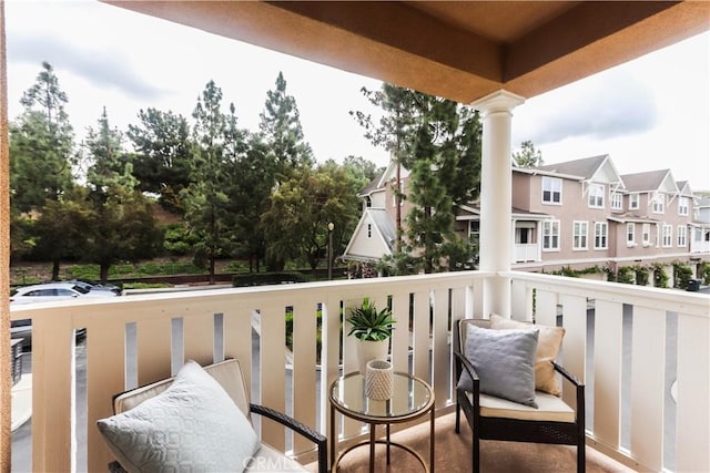 balcony featuring a residential view