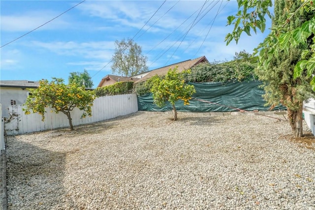 view of yard with fence