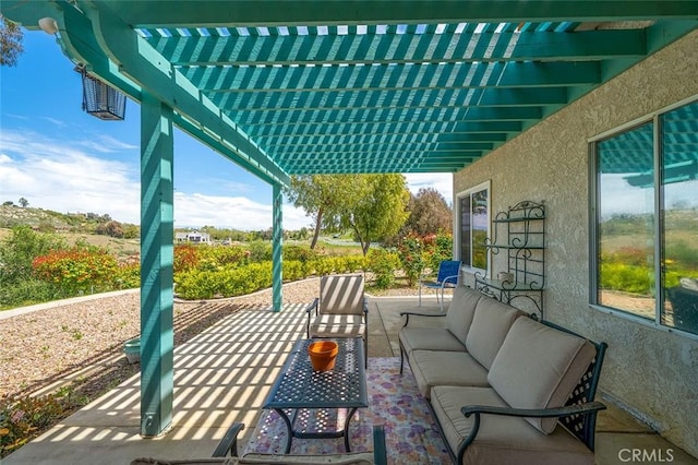 view of patio / terrace with a pergola and outdoor lounge area