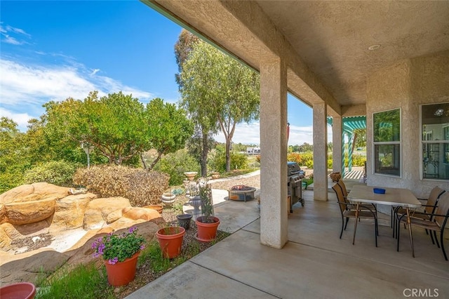 view of patio with outdoor dining space