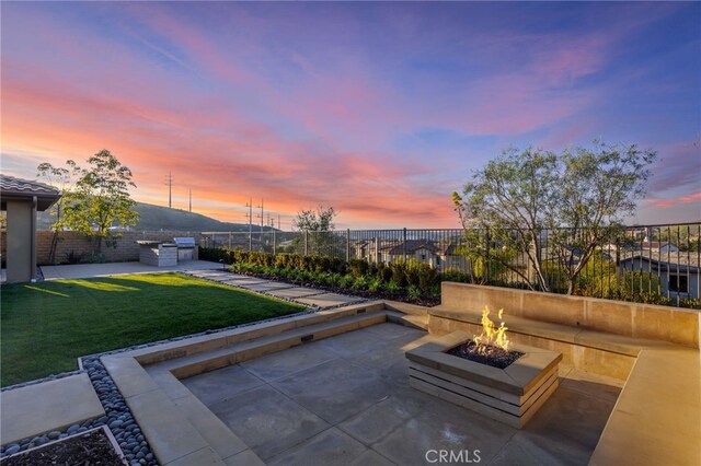 29311 Paseo Palmar, San Juan Capistrano, CA 92675 - patio terrace at dusk featuring a patio and a fire pit