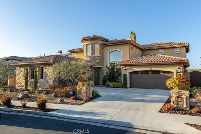 29311 Paseo Palmar, San Juan Capistrano, CA 92675 - mediterranean / spanish home featuring stucco siding, a garage, stone siding, driveway, and a tile roof