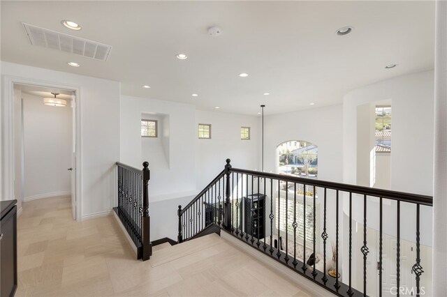 29311 Paseo Palmar, San Juan Capistrano, CA 92675 - corridor with an upstairs landing, recessed lighting, plenty of natural light, and baseboards