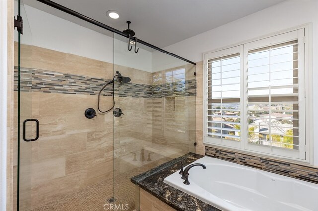 29311 Paseo Palmar, San Juan Capistrano, CA 92675 - bathroom featuring a stall shower and a bath