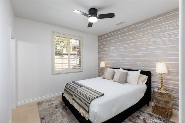 29311 Paseo Palmar, San Juan Capistrano, CA 92675 - bedroom with an accent wall, baseboards, wallpapered walls, and a ceiling fan