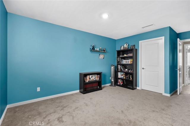 interior space with baseboards and visible vents