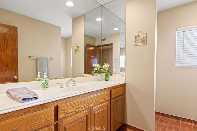 130 N Avenida Veracruz, Anaheim, CA 92808 - bathroom with vanity, brick floor, recessed lighting, and visible vents