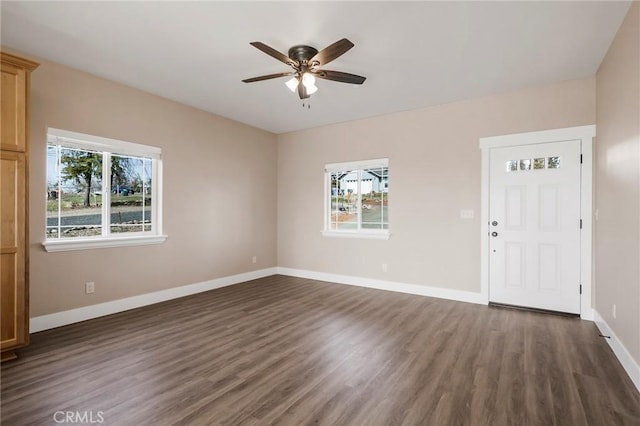 1411 Elliott Rd, Paradise, CA 95969 - empty room featuring plenty of natural light, a ceiling fan, and dark wood-style flooring