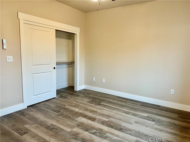1411 Elliott Rd, Paradise, CA 95969 - unfurnished bedroom featuring dark wood-type flooring and a closet