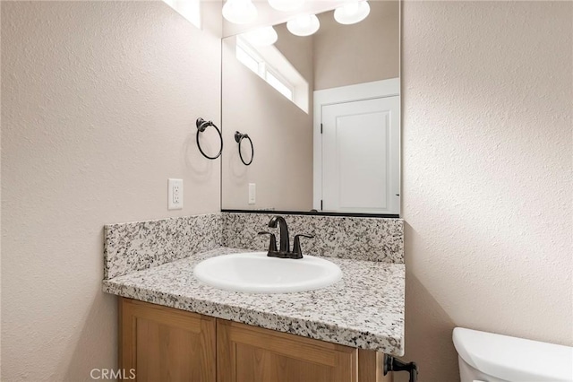1411 Elliott Rd, Paradise, CA 95969 - half bath featuring vanity and a textured wall