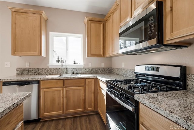 1411 Elliott Rd, Paradise, CA 95969 - kitchen with stainless steel appliances, light brown cabinets, dark wood-style flooring, and light stone countertops