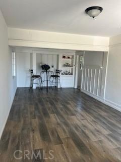 586 W 1st St, San Pedro, CA 90731 - dining area with baseboards and wood finished floors