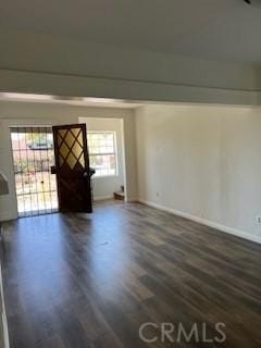 586 W 1st St, San Pedro, CA 90731 - unfurnished room featuring dark wood-style flooring and baseboards