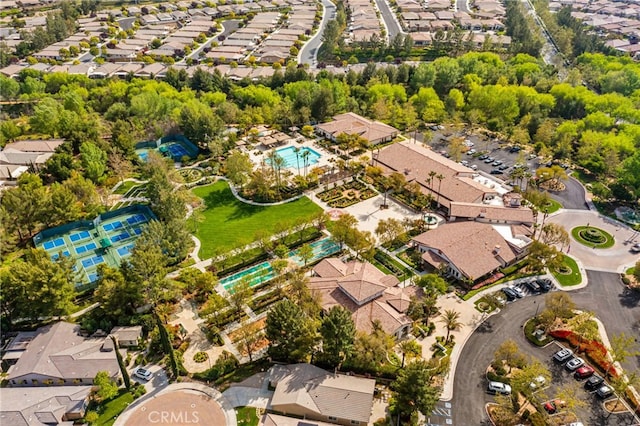 birds eye view of property with a residential view