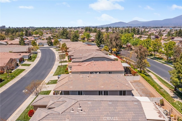aerial view featuring a mountain view and a residential view