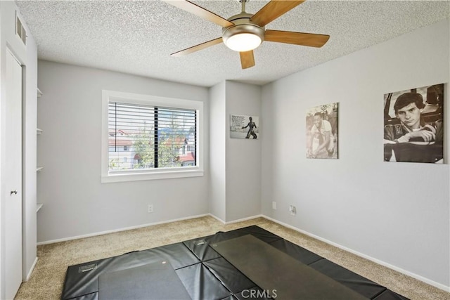 27633 Nugget Dr Unit 1, Canyon Country, CA 91387 - carpeted empty room featuring a textured ceiling, visible vents, a ceiling fan, and baseboards