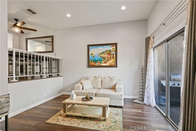 27633 Nugget Dr Unit 1, Canyon Country, CA 91387 - living area featuring wood finished floors, visible vents, baseboards, and ceiling fan