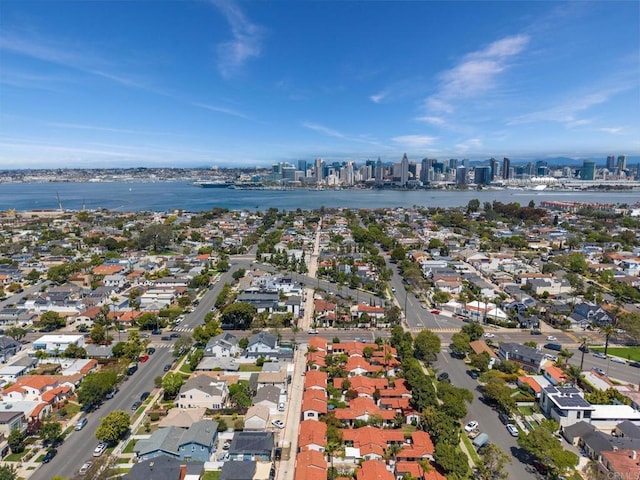 bird's eye view featuring a residential view, a city view, and a water view
