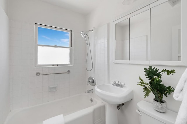 full bathroom with toilet and shower / washtub combination