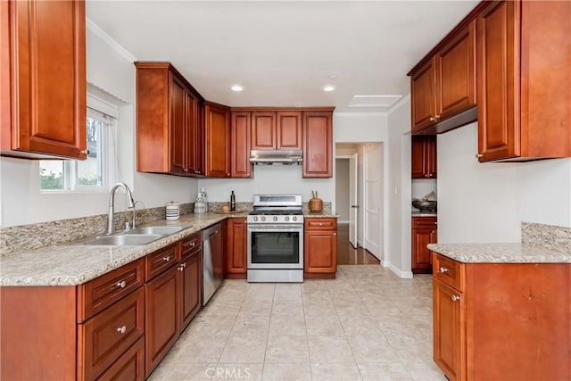 kitchen with recessed lighting, under cabinet range hood, stainless steel appliances, ornamental molding, and a sink