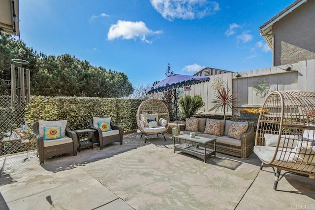 view of patio / terrace with a fenced backyard and an outdoor hangout area