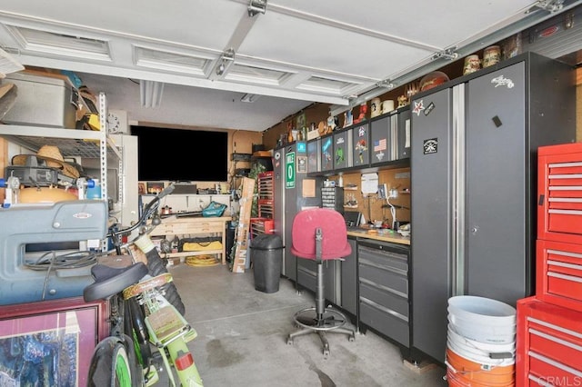 garage with a workshop area