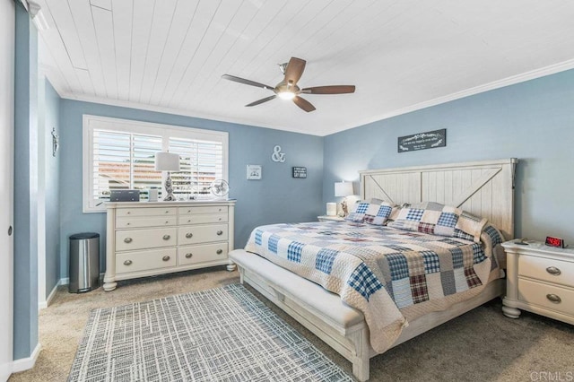 bedroom featuring crown molding, a ceiling fan, baseboards, and light carpet