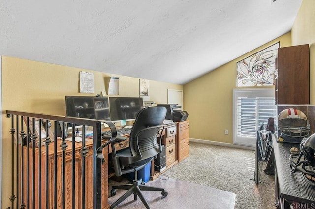 office area with carpet floors, baseboards, a textured ceiling, and lofted ceiling