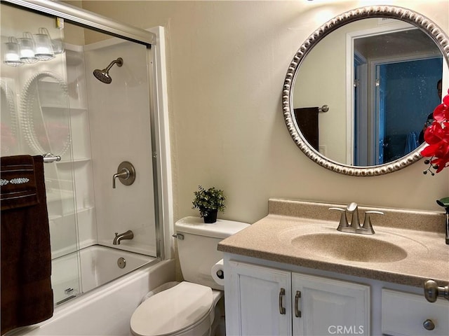 2576 E Coventry Cir Unit 98, Fullerton, CA 92833 - bathroom featuring vanity, combined bath / shower with glass door, and toilet