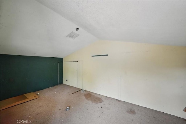 bonus room featuring vaulted ceiling
