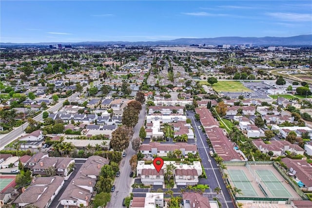 334 Tours Ln, Costa Mesa, CA 92627 - aerial overview of property's location featuring mountains and nearby suburban area