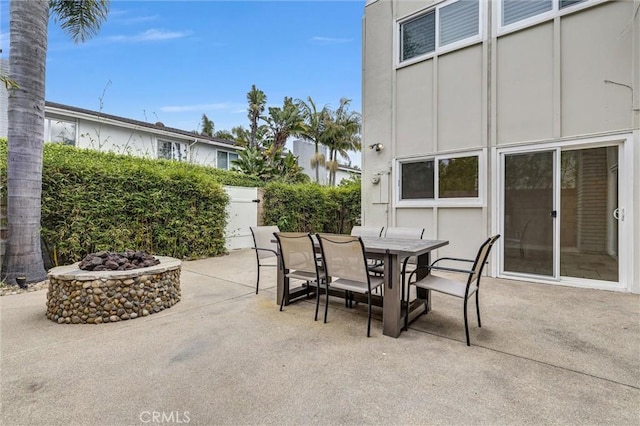 334 Tours Ln, Costa Mesa, CA 92627 - view of patio with a fire pit and outdoor dining area